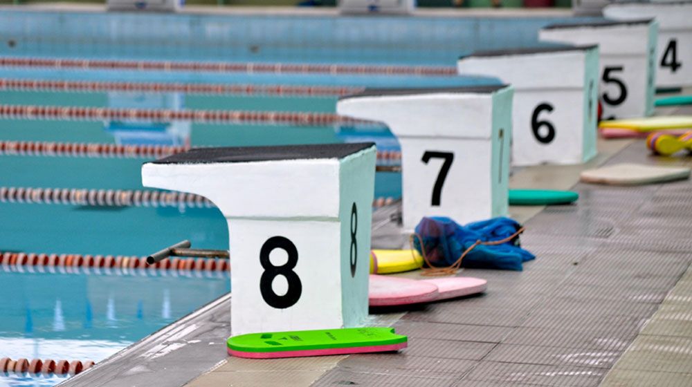 Line up for an 8 person swim race