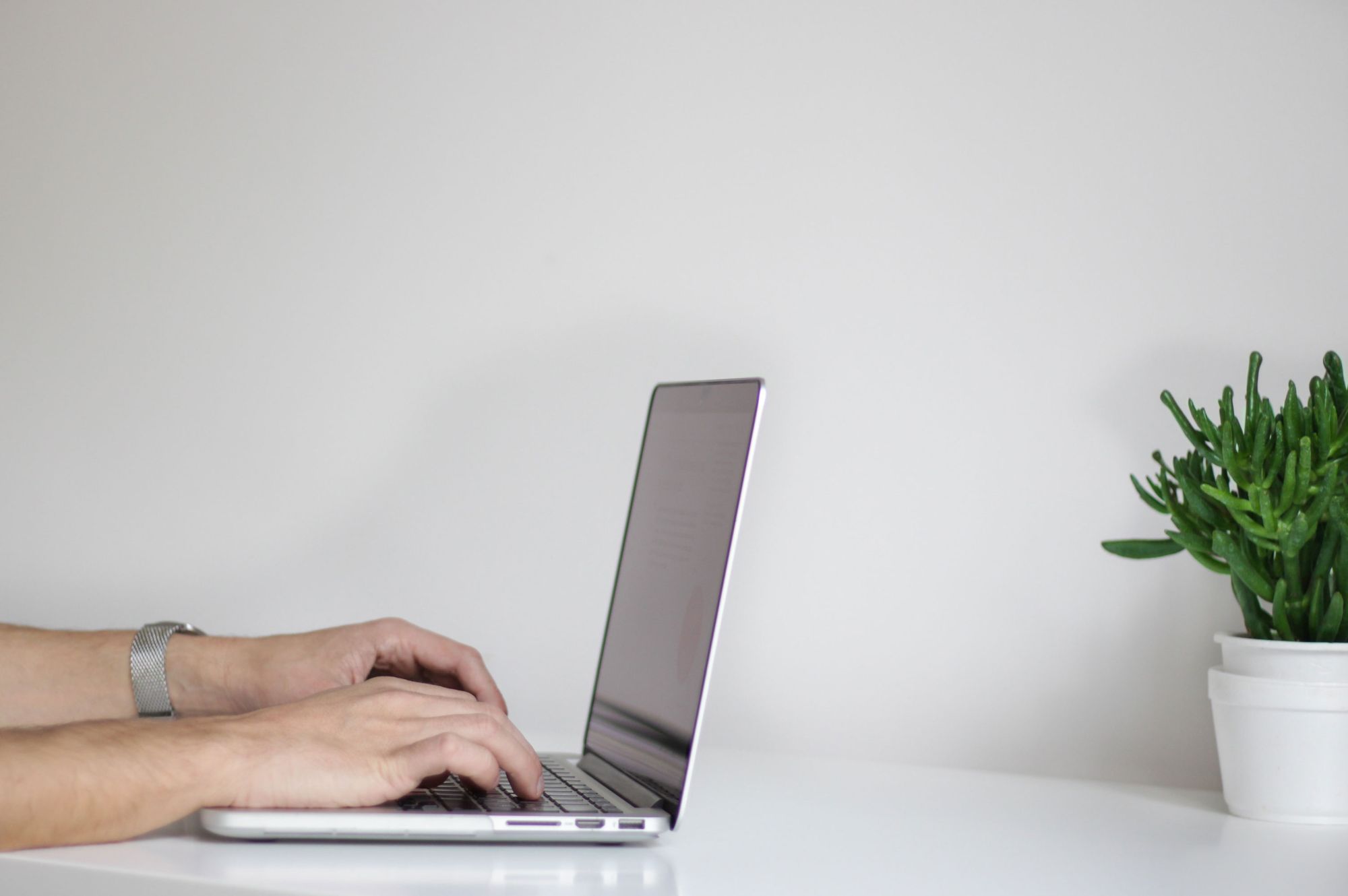 Man taking an online exam at home with TestReach during Covid-19