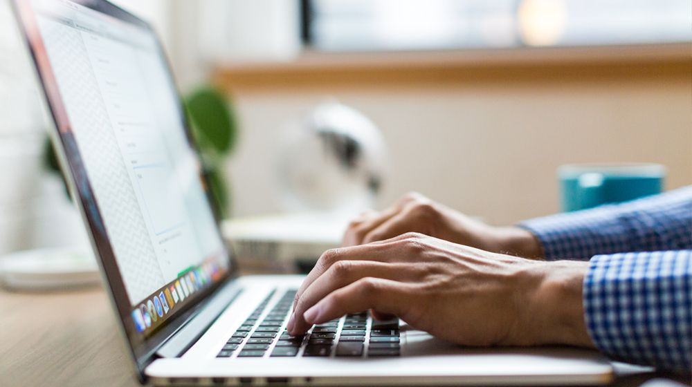 Student taking offline exam delivery on laptop