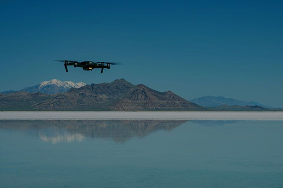 Aerial footage of a drone flying over mountains