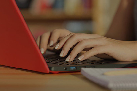 Accountant using laptop to sit an exam